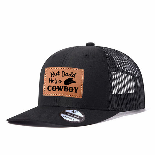 But Daddy He's A Cowboy Leather Patch Trucker Hat
